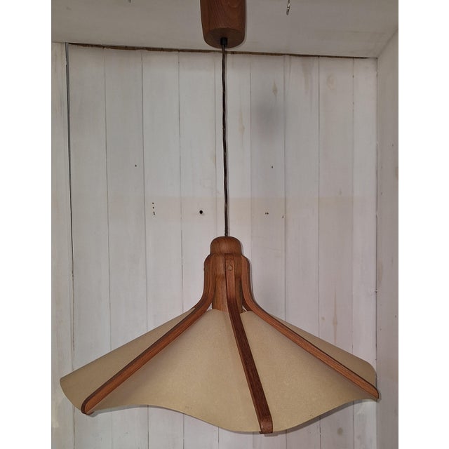 Vintage Pendant Lamp in Teak, 1970s, in Very Good conditions. Designed 1970 to 1979 Up to 250V (Europe/UK Standard).The...