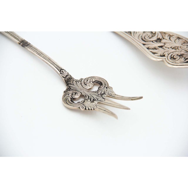 Cut Silver Fish Knife and Fork, Set of 2, in Very Good conditions. Designed 1920 to 1949 This piece has an attribution...