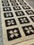 Handwoven geometric Mediterranean folk art tapestry by Nik. G. Mavrakis. Woven of wool and cotton in a modernist grid...