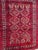 Pretty mid century Turkmen Baluch rug with a stylized designs and nice colours with red, purple, orange, brown, white and...