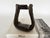 Add texture and character to your southwest décor with this single vintage leather western horse saddle stirrup. The...