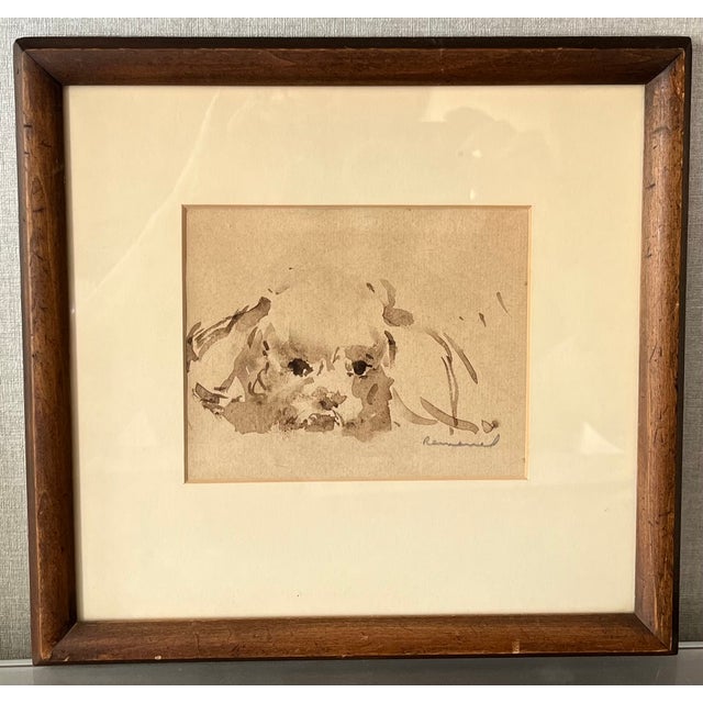 Louis Remmell (American 1920's) impressionist ink wash drawing of a puppy. Matted and framed in natural wood molding....
