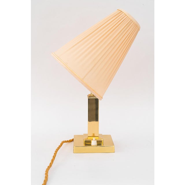 Brass polished and stove enameled The fabric shade is replacede ( new ) European Plug (up to 250V).The wiring of this item...