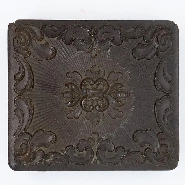 DETAILS An antique hand colored, ambrotype photograph of two sisters wearing matching dresses. Housed in a brown,...