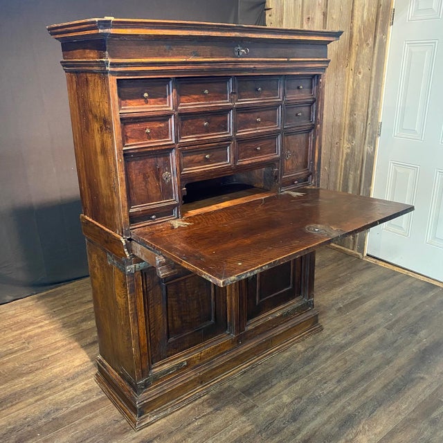 An exceptional quality 18th-century Spanish Bargueño desk cabinet, masterfully handcrafted in richly patinated walnut with...