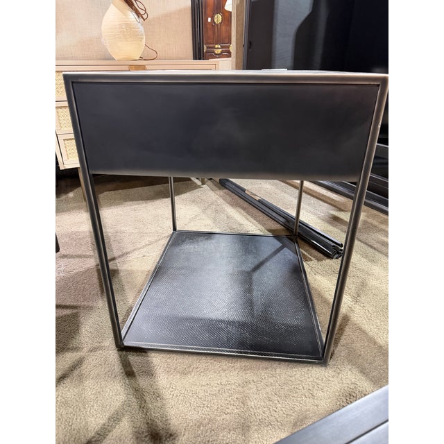 The Restoration Hardware “Gramercy” Mirrored Side Table brings a sophisticated industrial character to the home with its...