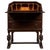 A handsome early 20th-century English bureau, finely crafted from oak and distinguished by its fitted writing interior,...