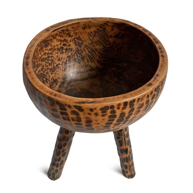 Vintage hand carved wooden bowl on three tall legs. Unique piece for display on its own or filled with items of your...