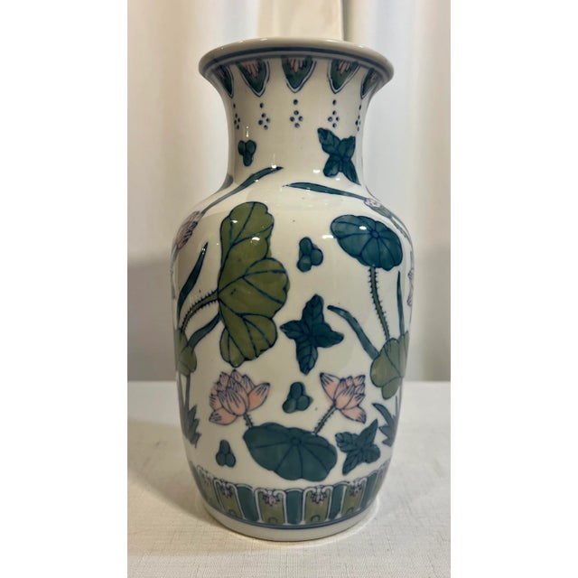 I am delighted to introduce you to this wonderful Chinoiserie Famille Verte Vase. This exquisite vase will surely add a...