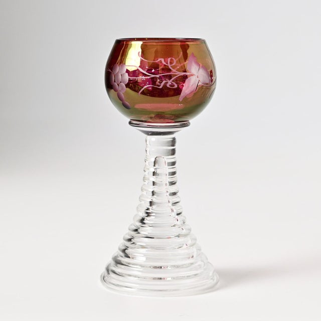 Set of four Swedish, early 20th century, Romer type glasses. This piece is attributed to the mentioned designer/maker. It...
