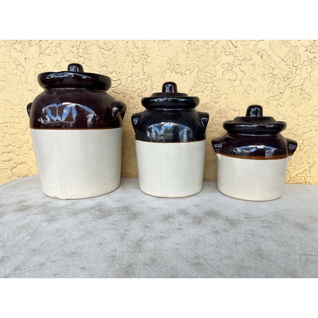 Add a touch of timeless, utilitarian charm to your kitchen counter with this beautiful vintage three-piece American...