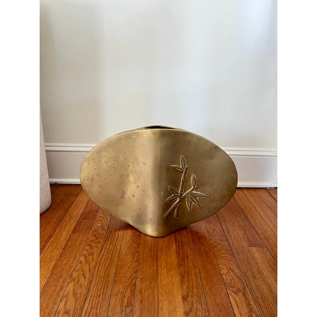 Beautiful oval vase by Dolbi Cashier with bamboo motif on both sides. Great visuals with oblong tapered design. Very heavy...
