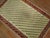Late 19th century antique Turkish Ghiordes rug. Ivory ground, small repetitive field surrounded by a floral red border 3'...