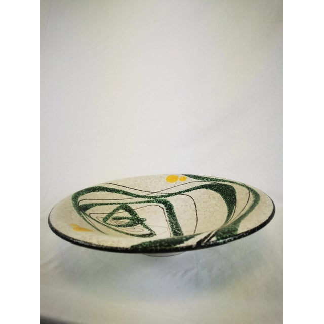 This Ruscha dish is an excellent example of modern ceramics from the 1950s and 1960s, a characteristic of German ceramics...