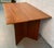 A beautifully crafted mid-century Scandinavian dining table by Nordisk Andels-Eksport of Denmark, showcasing the clean...