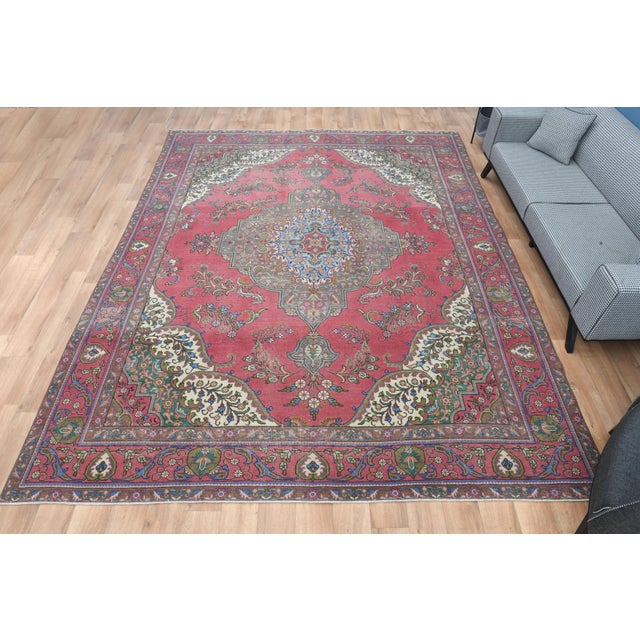 Vintage Persian Hand-Knotted vintage rug is a semi-antique vintage area rug. The '70s Eastern region of Turkey's unique...