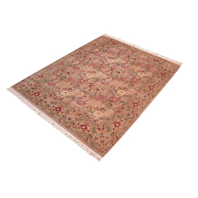 Designed with mesmerizing intricacy and gorgeous color palette, this hand-knotted masterpiece demonstrates the beauty and...
