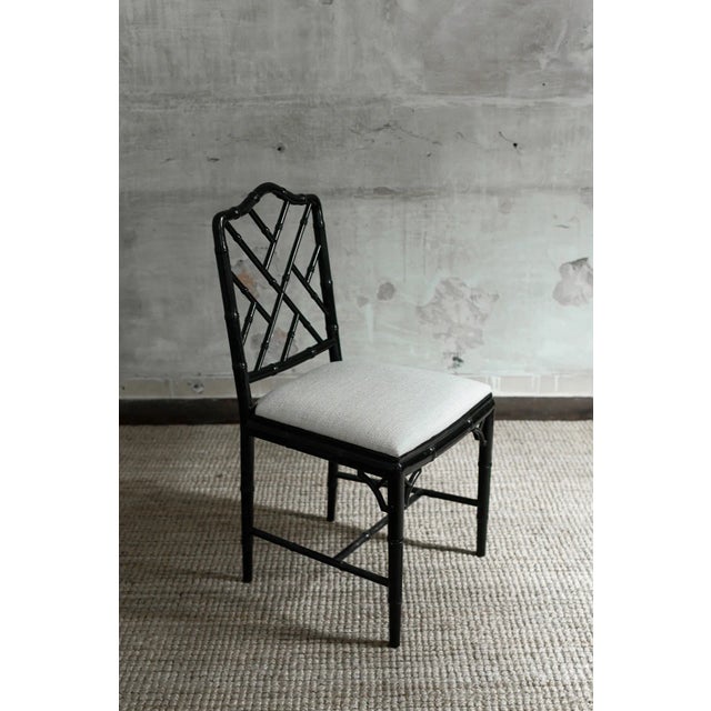 Set of 4 chippendale-style faux bamboo black lacquered chairs, 1970s Product Details Complete with fabric cushions....