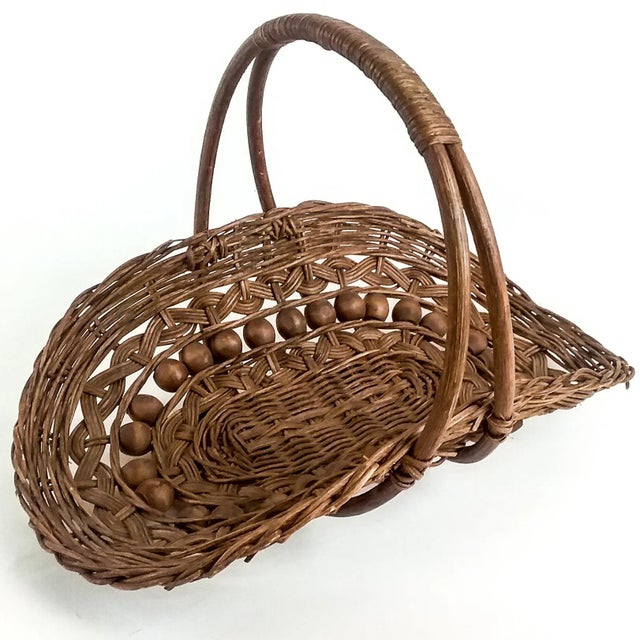 Very unique and unusual design for holding your magazines or newspaper. We love the curvy shape and bentwood handles. The...