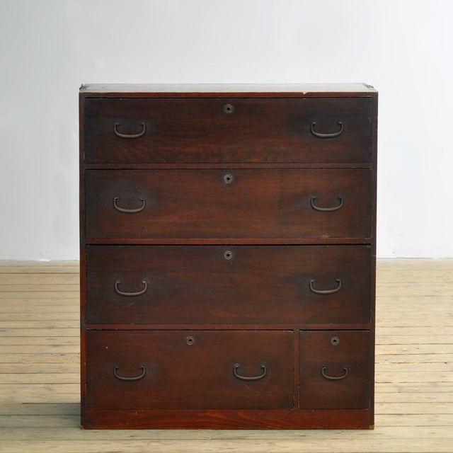Traditional Japanese Tansu chest of drawers from the 1890s. Manufactured during the late Meiji era (1868-1912). This piece...