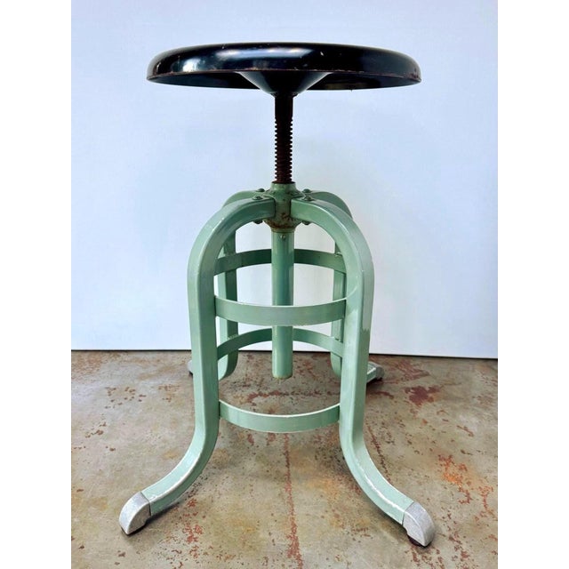 Vintage adjustable medical or industrial stool by A.S. Aloe Company of St. Louis. The stool has a four-leg painted steel...