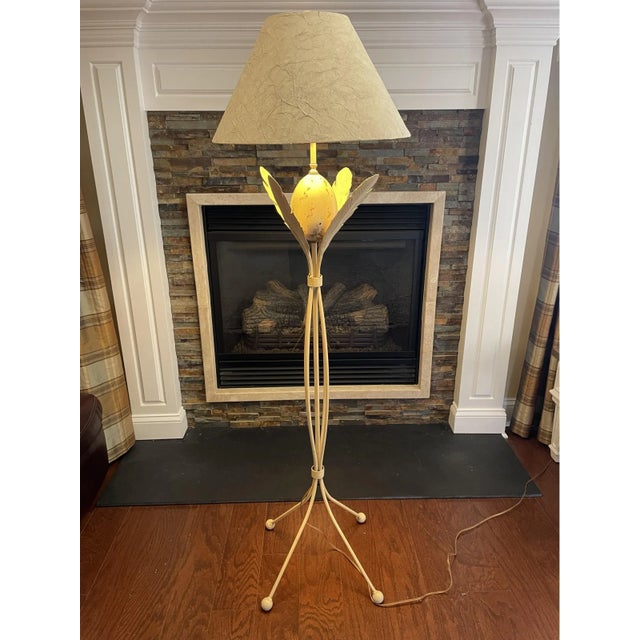 This a Mid Century Modern Torchiere floor lamp with its original shade. Its unique design makes it stand out in the room....