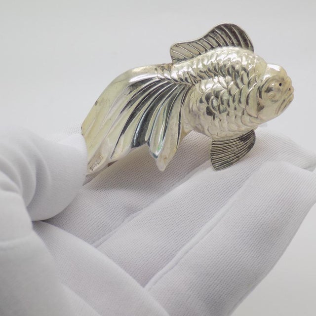 An unusual vintage object depicting a life-size fish, crafted in Hungary between the 1950s and 1960s in authentic silver....