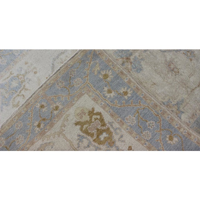 Textile Muted Oushak Rug in Blue, Light Brown, and White For Sale - Image 7 of 8
