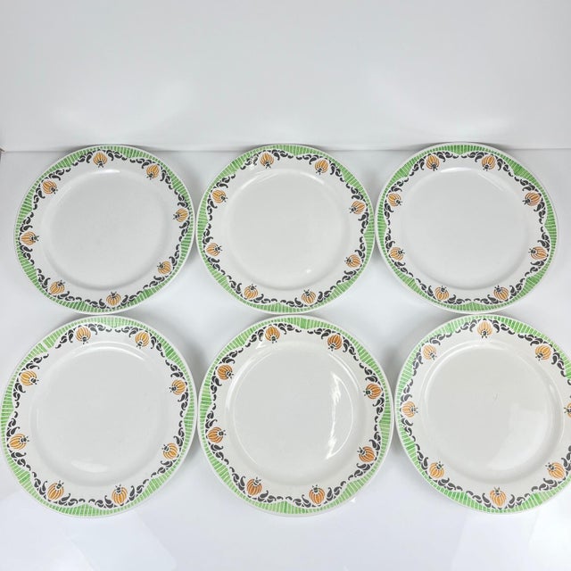 Set of 6 Sarreguemines "Maroussia" dinner plates, early 20th century White, green, orange and black Dimensions: Diameter:...