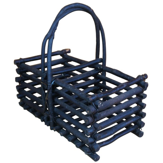 Vintage hand made arts and crafts farmhouse twig or stick basket. Made of wood featuring rectangular form with slatted /...