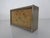 A Kienzle table clock from the 1960s, made of brushed aluminum and cork. The clock comes in its original packaging and...