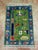 Afghan war rug, hand-knotted in Afghanistan from 100% wool. Measuring 2’ x 2’11”, the rug features a distinctive pictorial...