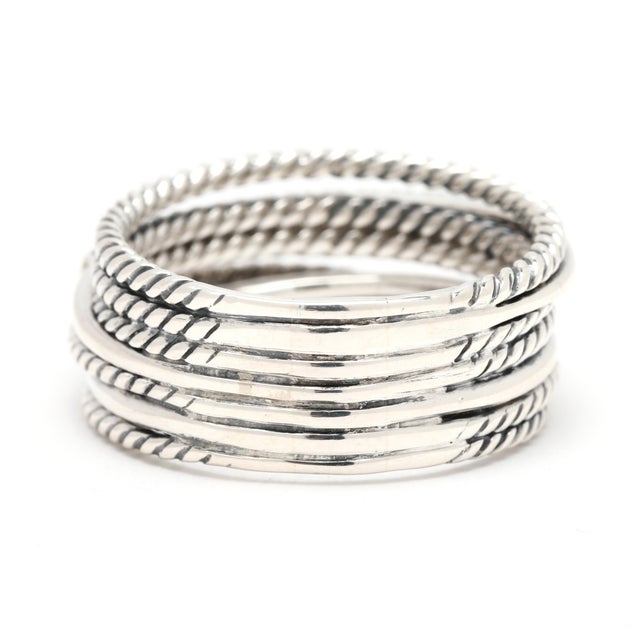 Stones: diamond round brilliant cut Ring Size: 9.5 Rise Off Of Finger: 3.9 mm Width: 10.6 mm Weight: 4.9 dwts/ 7.7 grams...