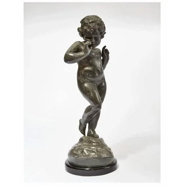 This is a wonderful example of a late 19th century English lead putti. These English lead figures were traditionally...