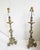 Characterful antique pair of candlestick table lamps having carved wood weathered painted & gilded forms. Intentionally...