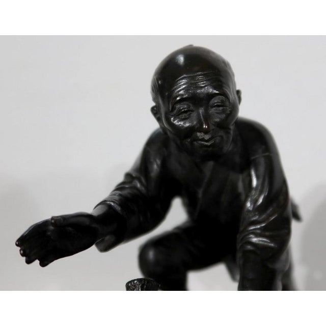 The Peasant Trapping the Bird Under His Hat, 20th-century, Bronze For Sale - Image 12 of 18