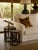Vintage three-piece set from the 1970s, comprising two round side tables and a wall mirror, crafted from natural bamboo...