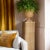 Rattan urns with pedestals holds 5 gallon plant as shown. 13.5" square 61" high. Used for one night; otherwise, brand new...