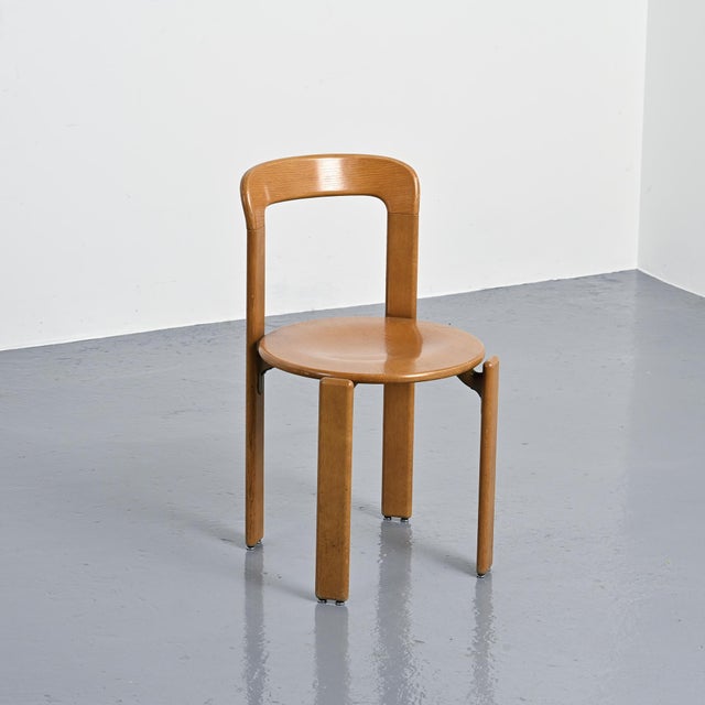 Chair 3300, designed by Bruno Rey for Dietiker in Switzerland in the 1970s. Made of bent and assembled wood, it is...
