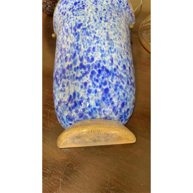 Fantastic wall light, single. Glass of the Aureliano Toso transparent color with gold and green tending to the blue,...