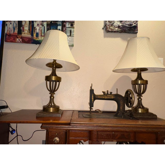 aesthetic. Design Features: - Distinctive open-air, multi-strap metal cage bodies reminiscent of classical Grecian urns. -...