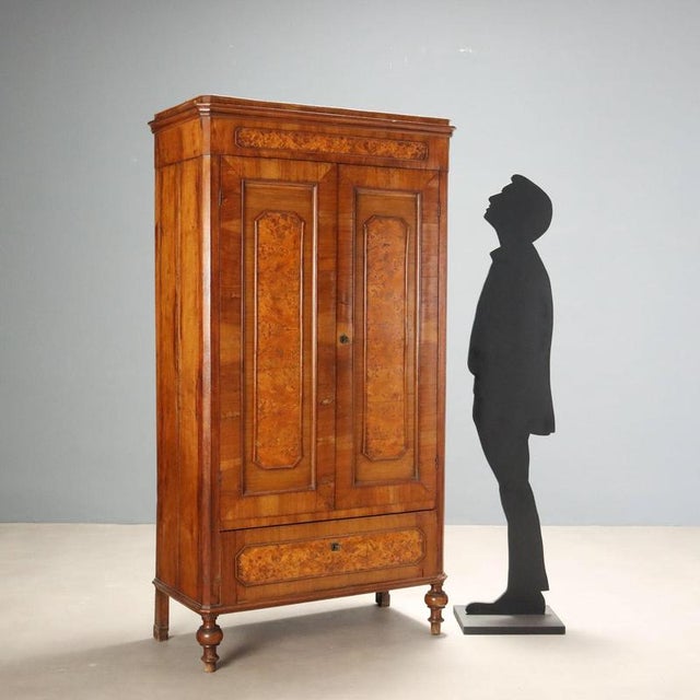 Umbertino wardrobe in walnut and walnut burl dating back to the late 19th century, an example of Italian artisanal...
