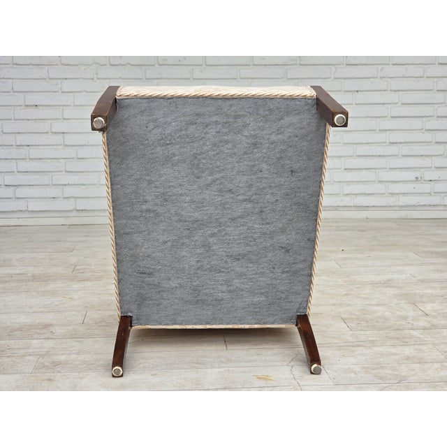 1960s, Danish armchair. Furniture wool fabric, beech wood, springs in the seat. Chair was reupholstered by craftsman about...