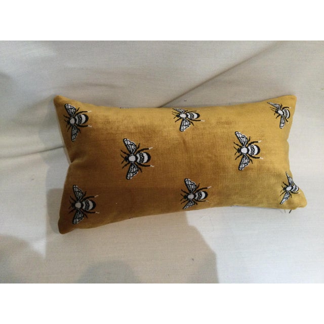 Black and white bees on a turmeric background. Velvet material. 23x13 insert provided.