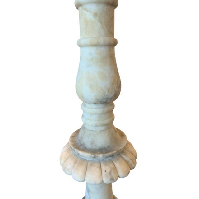 Beautiful vintage marble pedestal. 19 1/2" tall with a 7 1/2" footprint. Top is 4 1/2" across.
