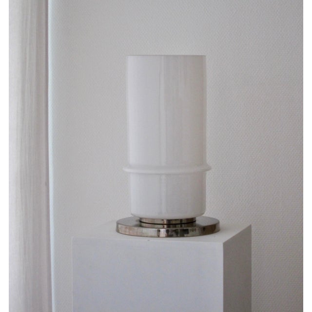Elegant opaline lamp of the 1960s. Moulded detail on the circumference of the opaline tub. Soft white opaline tone and...