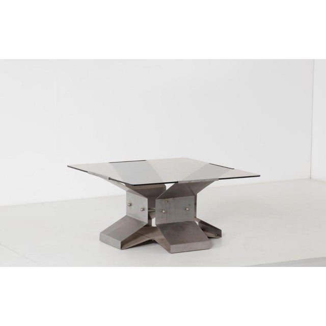 Vintage table is an original design work realized in the 1970s. Made in Italy. Original crystal and steel. Total...