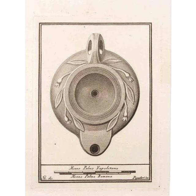 Oil lamp with decoration is an etching realized by carlo pignatari (18th century). The etching belongs to the print suite...