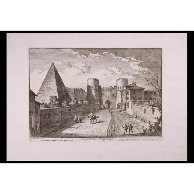 Porta S. Paolo is an original black and white etching of the Late 18th century realized by Giuseppe Vasi. Signed and...