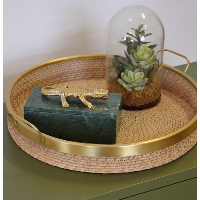 New special order item. Not vintage. Bring a touch of woven warmth to your table with this charming round rattan tray....